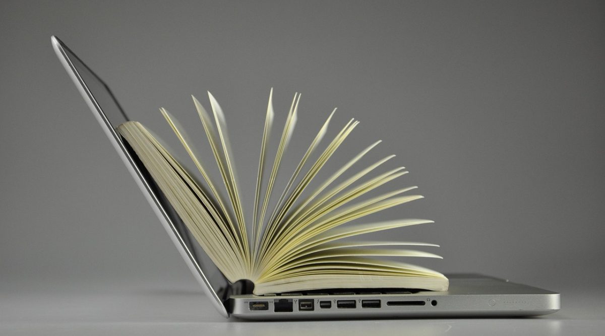 Laptop, book, information — Ethical Gambling Practices in KOITOTO Toto Macau