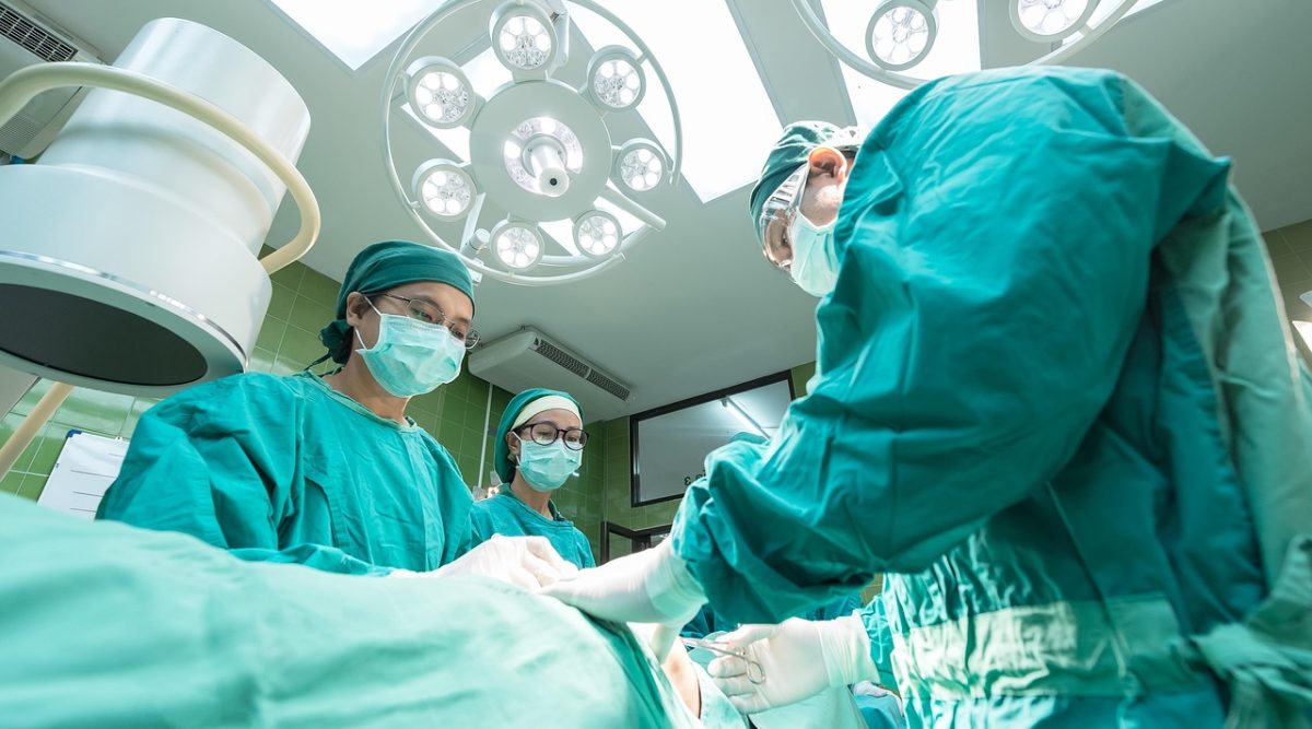 Surgery, hospital, medical professionals — Guiding Light: Dr. Julie Taguchi's Principles in Chronic Health Management
