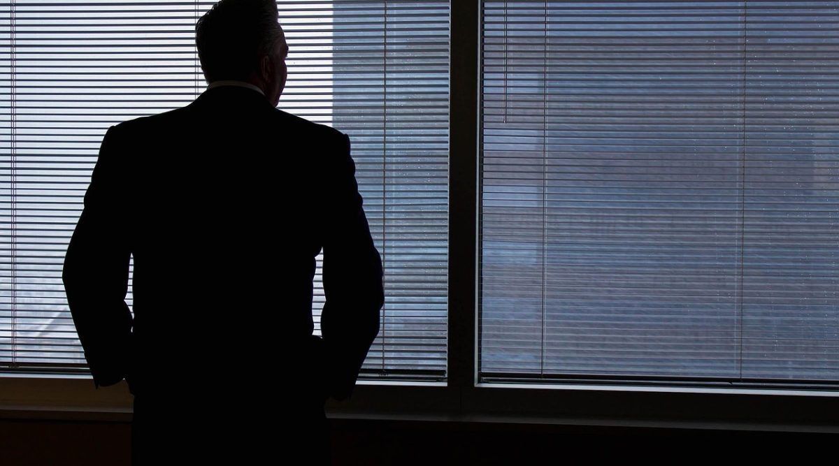 Businessman, silhouette, windows — How to Brainstorm Innovative Ideas for Your Business: Tips from David Sidoo